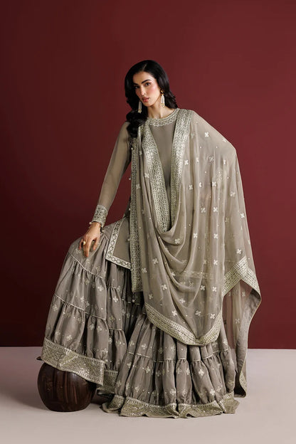 Model wearing grey colored Pakistani branded traditional flared gharara set Australia 