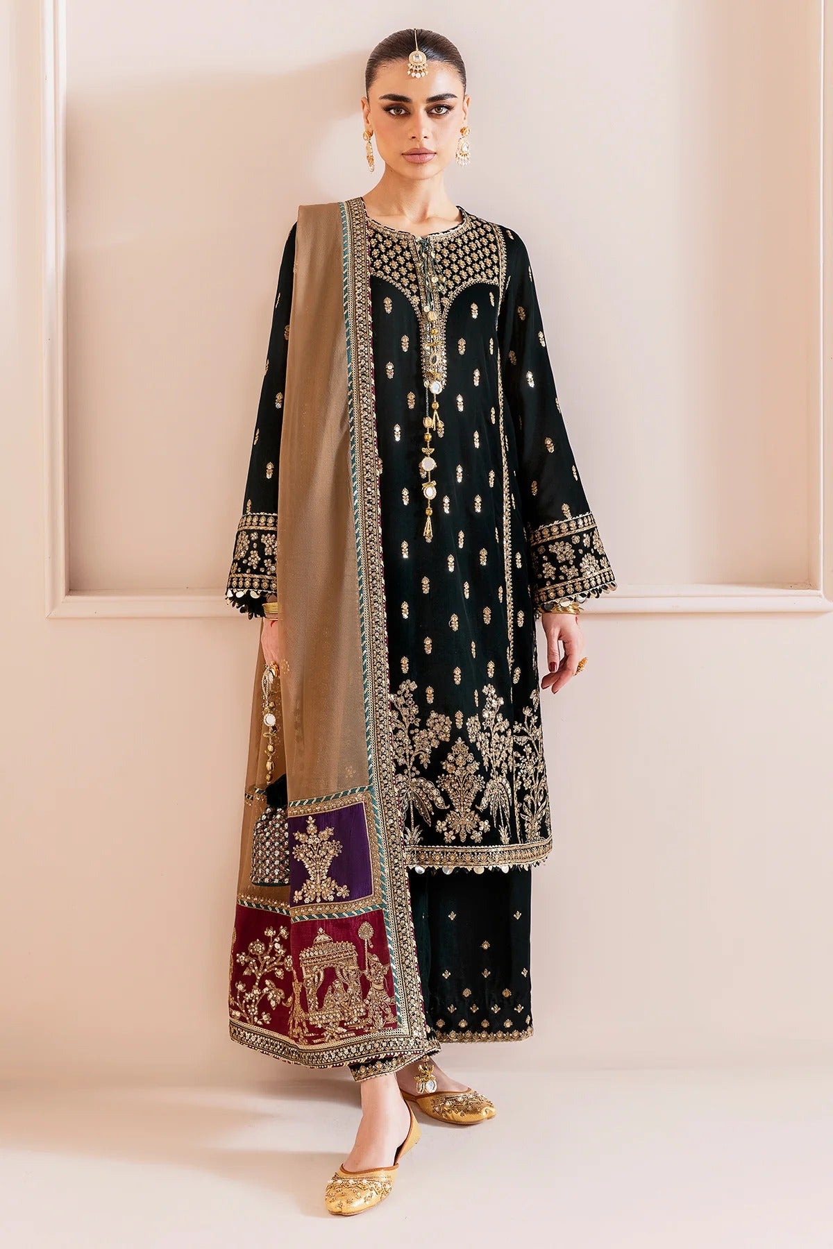 women wearng black and gold velvet dress in Ausralia