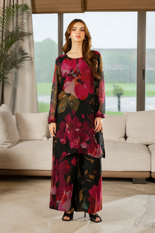 Woman wearing a floral coord dress in a modern living room